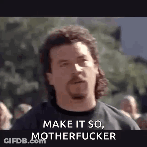A Man With A Beard Is Standing In Front Of A Crowd And Says `` Make It So , Motherfucker '' GIF