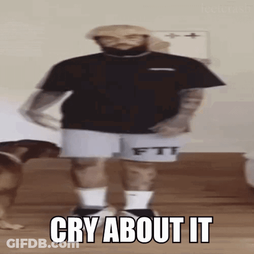 A Man With A Beard Is Standing In Front Of A Dog And Says `` Cry About It '' While Dancing . GIF