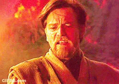 A Man With A Beard Is Standing In Front Of A Fire With His Eyes Closed And His Face Covered In Blood . GIF