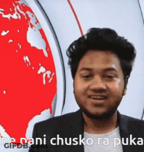 A Man With A Beard Is Standing In Front Of A Globe And Says `` Ne Pani Chusko Ra Puke '' . GIF