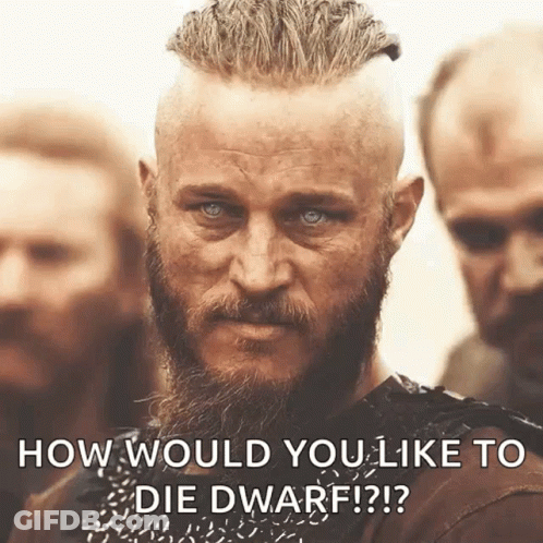 A Man With A Beard Is Standing In Front Of A Group Of Men And Says How Would You Like To Die Dwarf ? GIF
