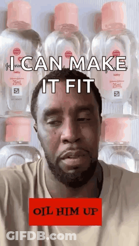 A Man With A Beard Is Standing In Front Of A Row Of Baby Oil Bottles And Says I Can Make It Fit GIF