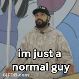 A Man With A Beard Is Standing In Front Of A Wall And Says " Im Just A Normal Guy " GIF