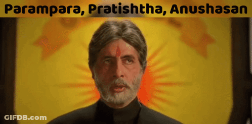 A Man With A Beard Is Standing In Front Of A Yellow Background With The Words Parampara Pratishtha Anushasan GIF
