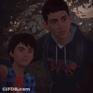 A Man With A Beard Is Standing Next To Another Man With Glasses GIF