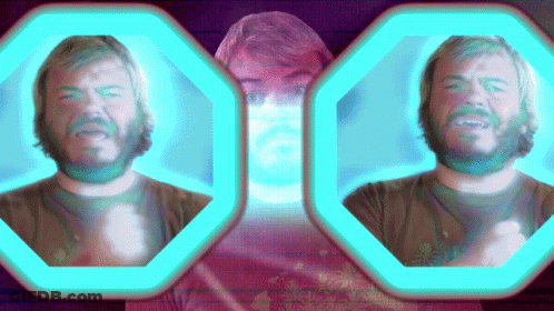 A Man With A Beard Is Surrounded By Blue Circles GIF