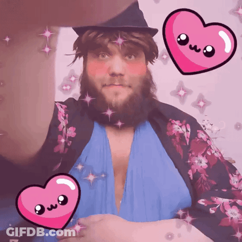 A Man With A Beard Is Surrounded By Pink Hearts With The Letters Owo On Them GIF