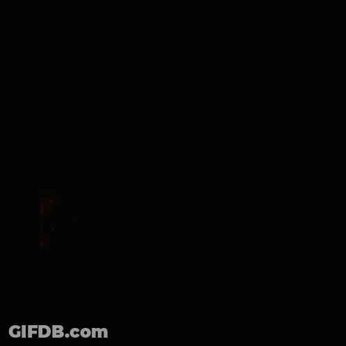 A Man With A Beard Is Surrounded By Sparkles And Stars GIF