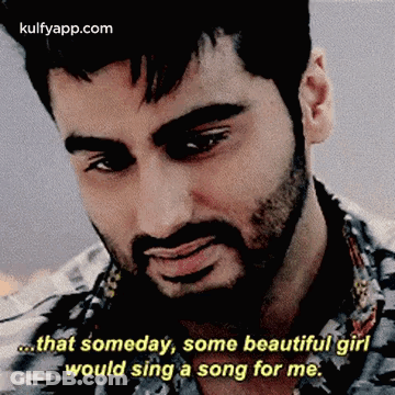 A Man With A Beard Is Talking About A Beautiful Girl . GIF