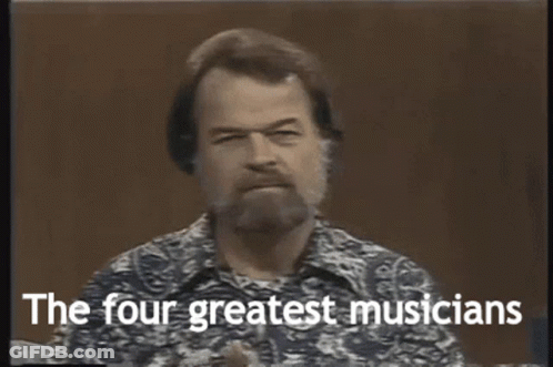 A Man With A Beard Is Talking About Four Greatest Musicians GIF