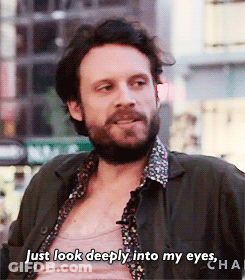 A Man With A Beard Is Talking About Looking Deeply Into His Eyes GIF