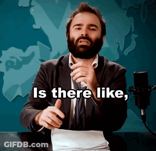 A Man With A Beard Is Talking Into A Microphone And The Words Is There Like Are Above Him GIF