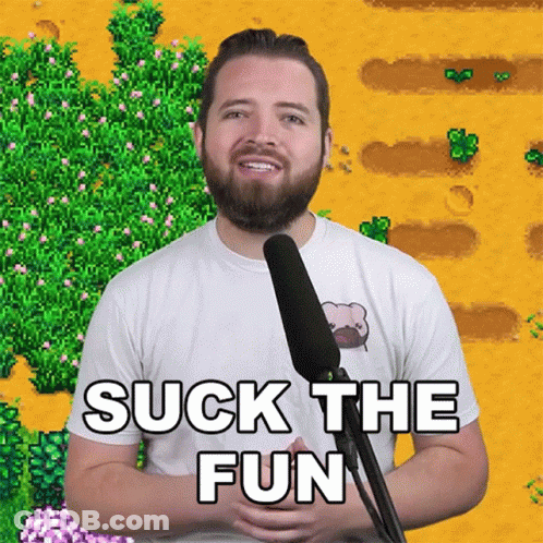 A Man With A Beard Is Talking Into A Microphone With The Words Suck The Fun Above Him GIF