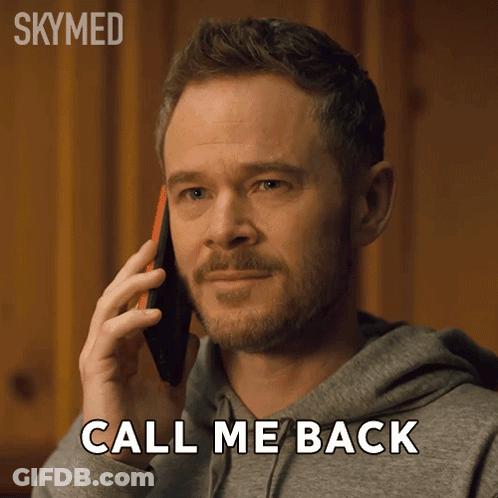 A Man With A Beard Is Talking On A Cell Phone With The Words Call Me Back Above Him GIF