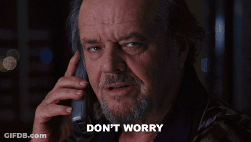 A Man With A Beard Is Talking On A Cell Phone With The Words " Don 'T Worry " Written Below Him GIF