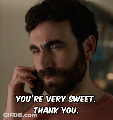 A Man With A Beard Is Talking On A Phone And Says You 'Re Very Sweet Thank You GIF