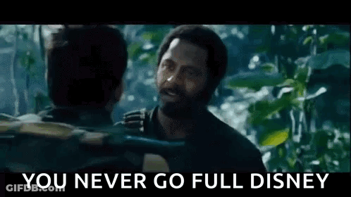A Man With A Beard Is Talking To Another Man In The Jungle And The Caption Says `` You Never Go Full Disney '' . GIF