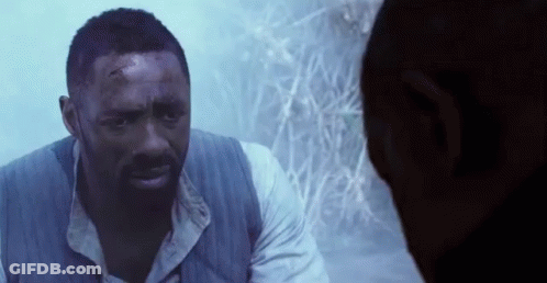 A Man With A Beard Is Talking To Another Man . GIF