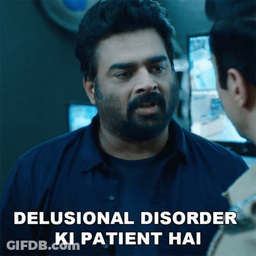 A Man With A Beard Is Talking To Another Man With The Words " Delusional Disorder Ki Patient Hai " Above Him GIF