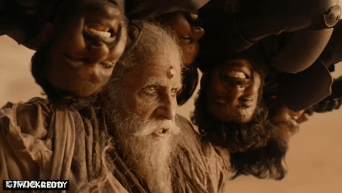 A Man With A Beard Is Upside Down With X7wickreddy Written On The Bottom Right GIF