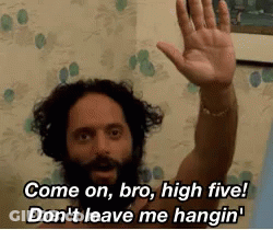 A Man With A Beard Is Waving His Hand And Says Come On Bro High Five GIF