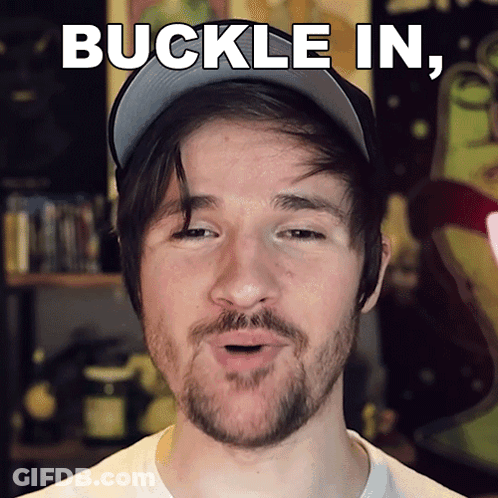 A Man With A Beard Is Wearing A Baseball Cap And Says " Buckle In " GIF