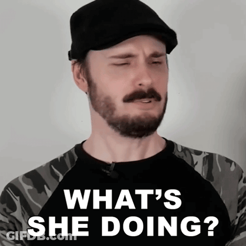 Man With Beard Wearing Black Hat And Shirt GIF
