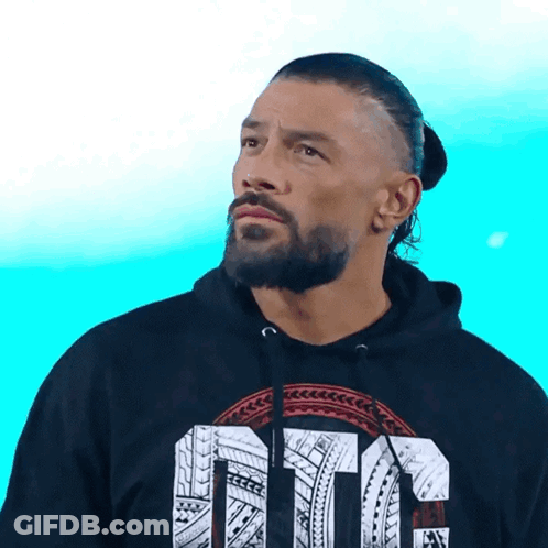 A Man With A Beard Is Wearing A Black Hoodie With The Word Ote On It GIF