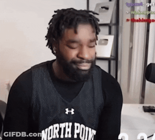 A Man With A Beard Is Wearing A Black North Point Jersey GIF