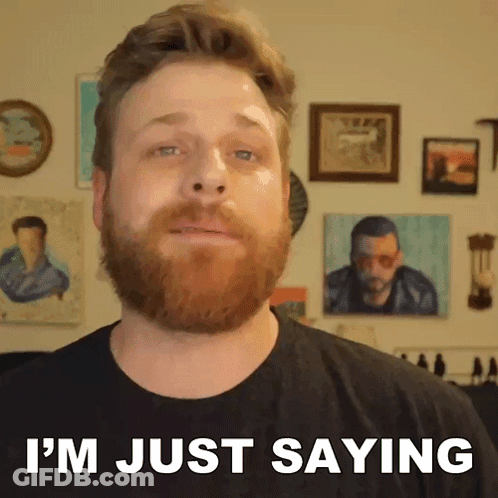 A Man With A Beard Is Wearing A Black Shirt And Says I 'M Just Saying GIF