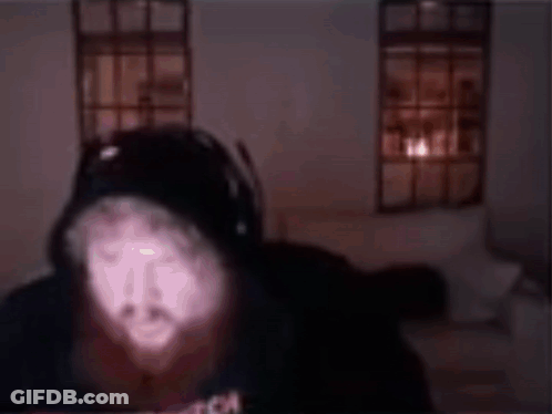 A Man With A Beard Is Wearing A Black Shirt That Says Angel Beard Man GIF