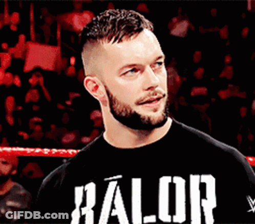 A Man With A Beard Is Wearing A Black Shirt That Says ' Halor ' On It GIF
