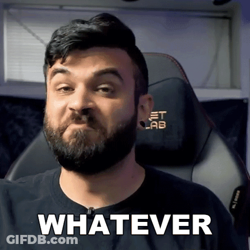 A Man With A Beard Is Wearing A Black Shirt That Says Whatever On It GIF