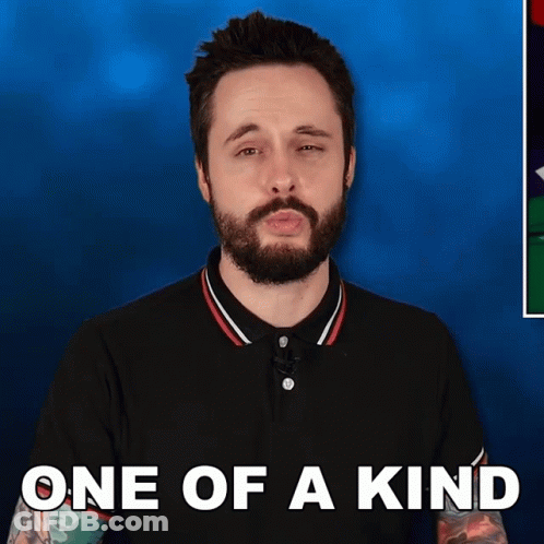 A Man With A Beard Is Wearing A Black Shirt With The Words One Of A Kind On It GIF