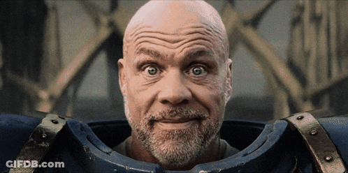 A Man With A Beard Is Wearing A Blue Armor GIF