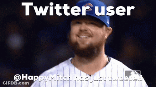 A Man With A Beard Is Wearing A Blue Hat And Smiling With The Words Twitter User GIF