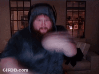 A Man With A Beard Is Wearing A Blue Hoodie GIF
