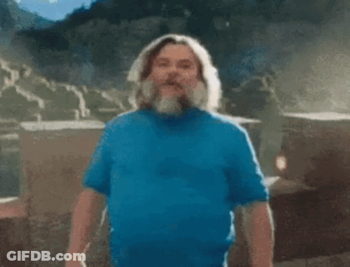 A Man With A Beard Is Wearing A Blue Shirt And Saying I Am GIF