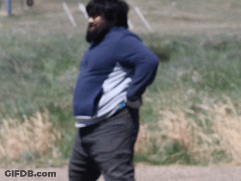 A Man With A Beard Is Wearing A Blue Sweatshirt GIF