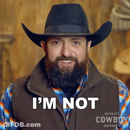 A Man With A Beard Is Wearing A Cowboy Hat And Vest And Says I 'M Not GIF