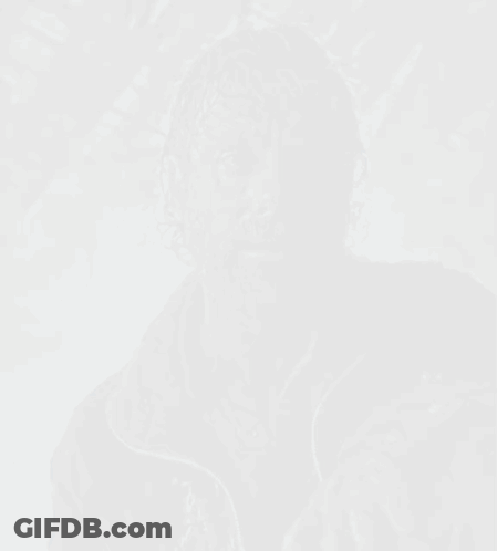 A Man With A Beard Is Wearing A Dark Jacket GIF