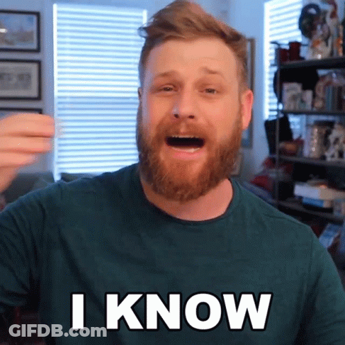 A Man With A Beard Is Wearing A Green Shirt And Says I Know GIF