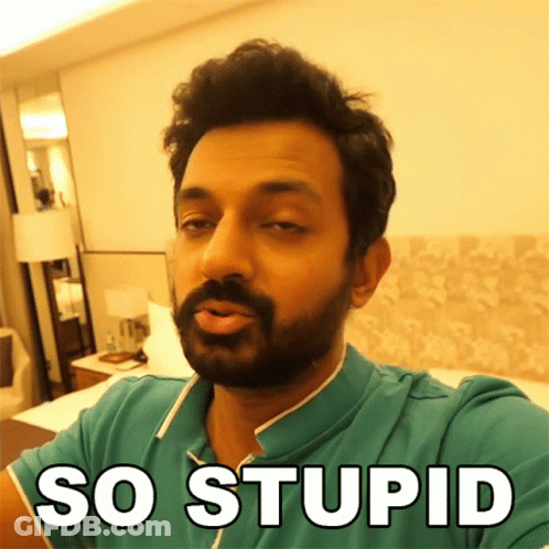 A Man With A Beard Is Wearing A Green Shirt That Says So Stupid On It GIF