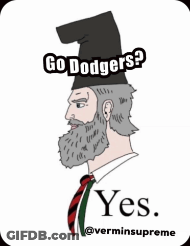 A Man With A Beard Is Wearing A Hat And Tie And Says Go Dodgers Yes GIF