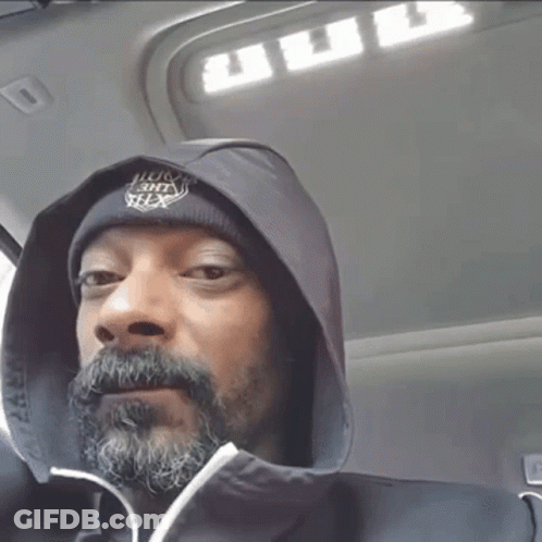 A Man With A Beard Is Wearing A Hooded Jacket And A Beanie That Says I Love You GIF