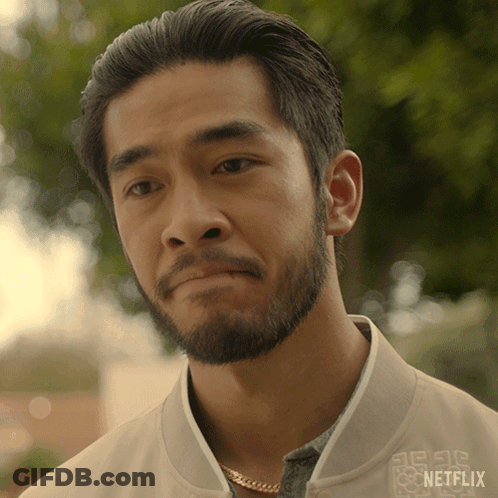 A Man With A Beard Is Wearing A Jacket That Says Netflix GIF