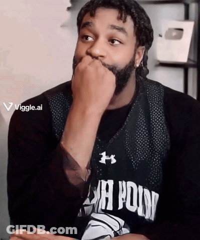 A Man With A Beard Is Wearing A Jersey That Says ' Jh Point ' On It GIF