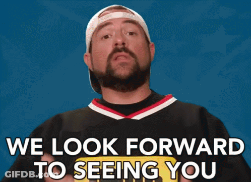 A Man With A Beard Is Wearing A Jersey That Says " We Look Forward To Seeing You " GIF