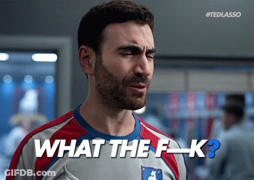 A Man With A Beard Is Wearing A Jersey That Says What The F-K GIF