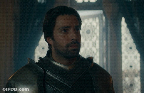 A Man With A Beard Is Wearing A Knight 'S Armor GIF